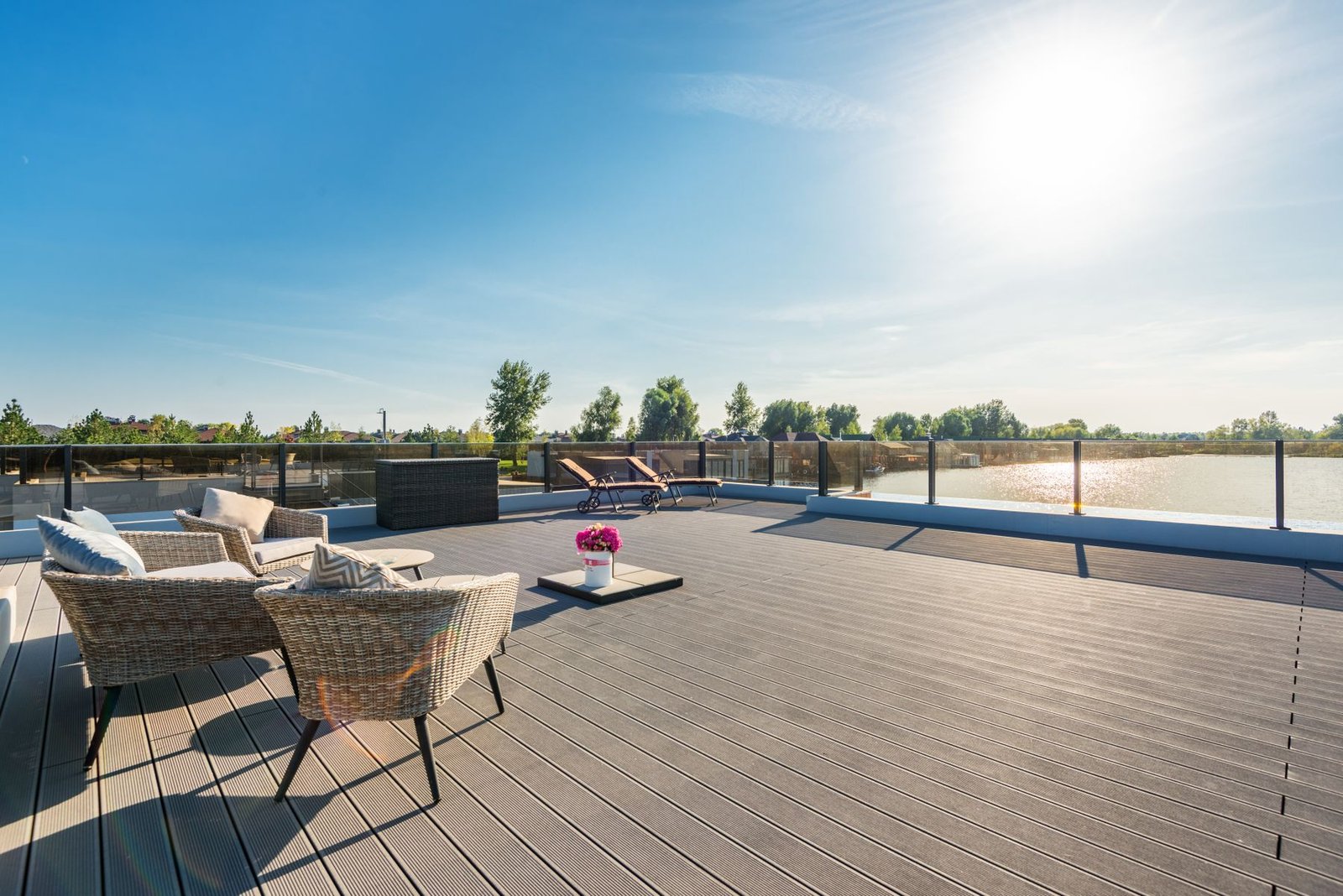 Wide deck with lounge seating in full sun