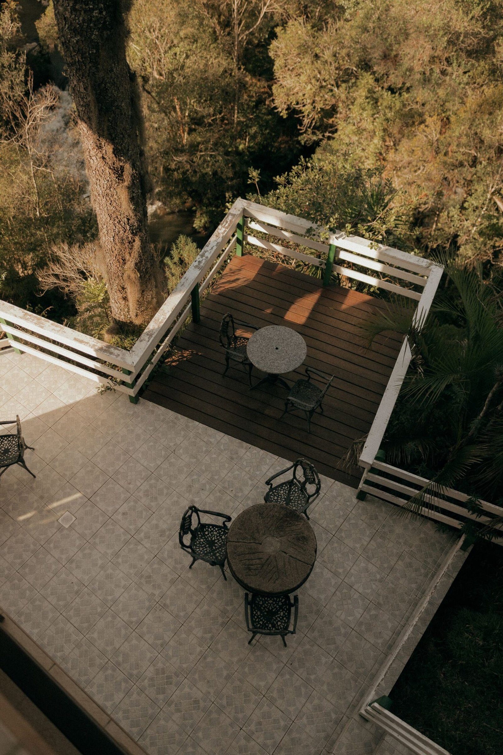 Outdoor patio with wood decking and a forest view